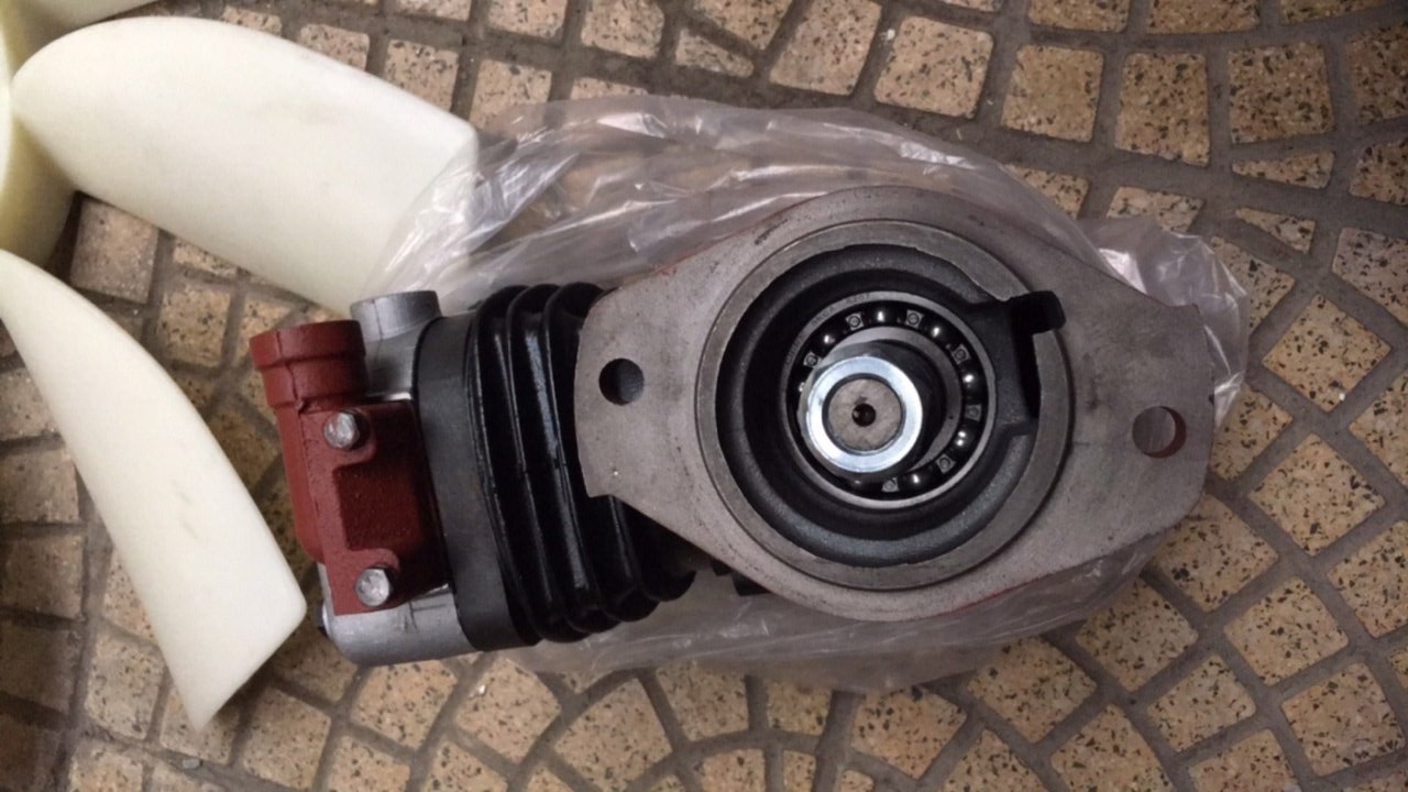 bơm hơi xe xúc lật