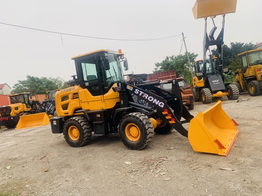máy xúc lật gầu 0.9 m3 Strong ZL933 máy xúc lật gầu 0.9 m3 Strong ZL933